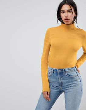 yellow turtleneck
