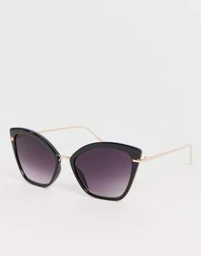 ASOS DESIGN cat eye sunglasses with metal nose bridge
