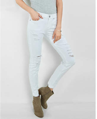 Express distressed mid rise white jean leggings