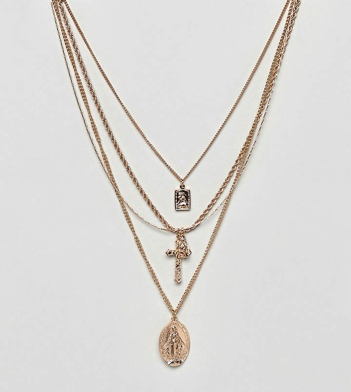 DESIGN Curve multirow necklace with vintage style icon and cross pendants in gold
