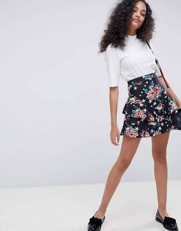 – Minirock mit Rosen- und Sternenprint