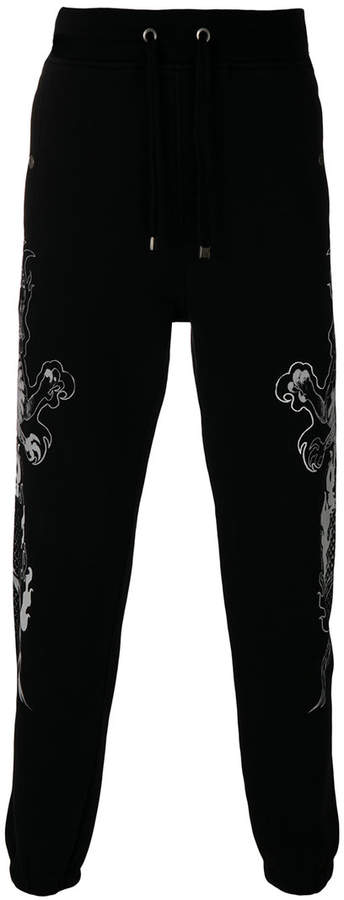 dragon print track pants