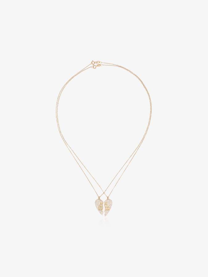 Established 18kt yellow gold two piece heart necklace with diamonds