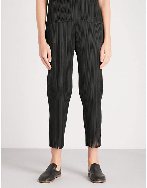 Fringed-hem cropped pleated trousers