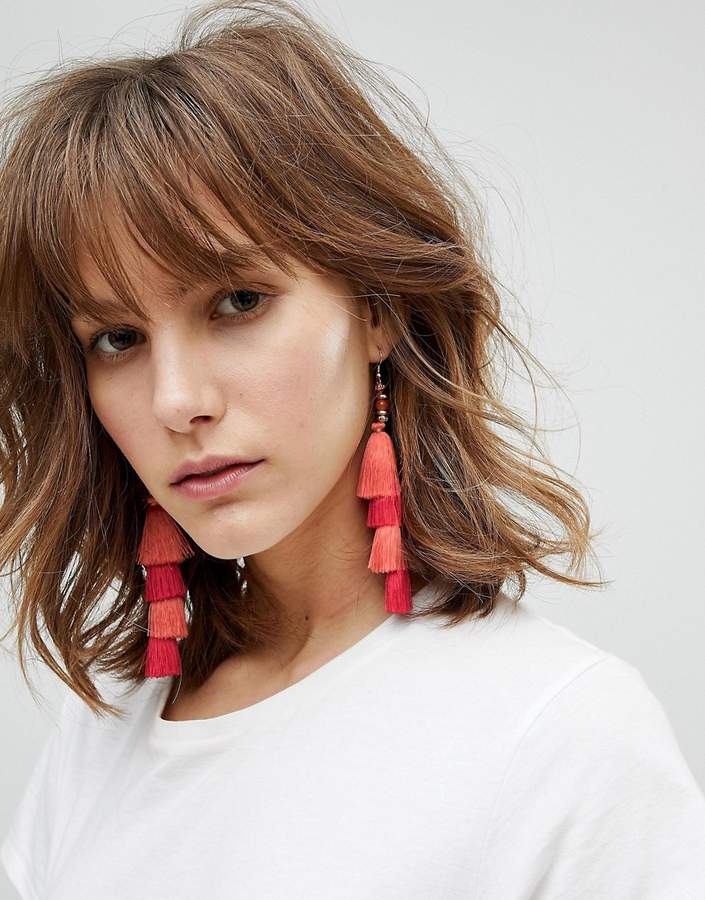 – Ohrringe mit gestuften Quasten