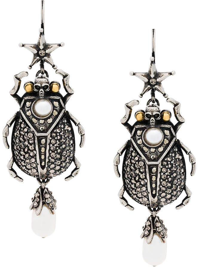 skull insect earrings