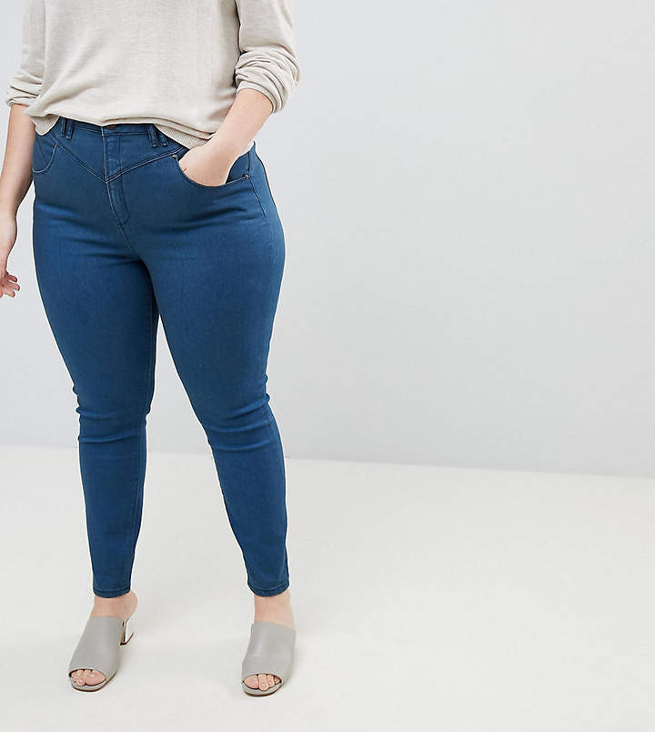 – RIDLEY – Enge Jeans mit hoher Taille im Gia-Stil mit dunkelblauer Freddie-Waschung