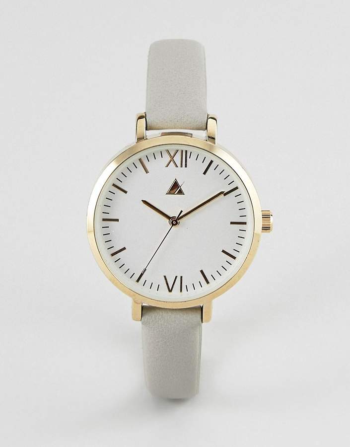 – Minimalistische Uhr in Gold und Grau