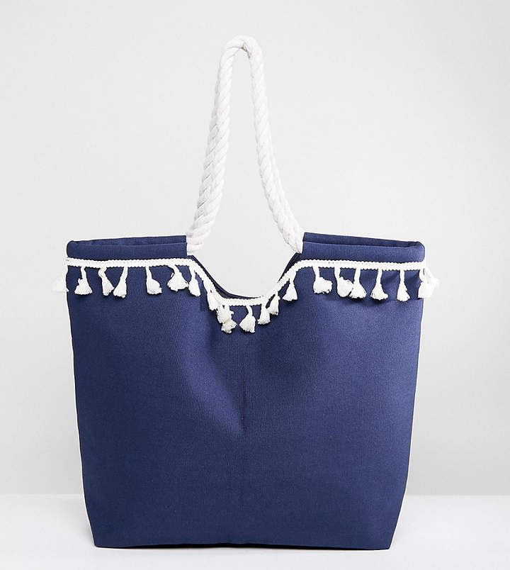 – Marineblaue Strandtasche mit weißen Bommeln