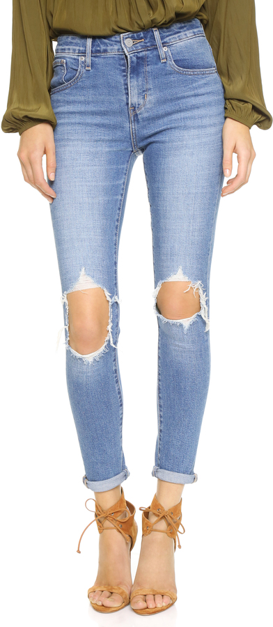 721 High Rise Distressed Skinny Jeans