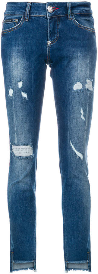 distressed high low raw hem skinny jeans