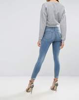 Thumbnail for your product : ASOS Ridley Skinny Jeans In Lotus Wash With Rip & Repair