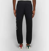 Thumbnail for your product : Gucci Tapered Logo-Print Loopback Cotton-Jersey Sweatpants