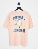 Thumbnail for your product : Jordan Heritage oversized jumpman logo t-shirt in arctic orange