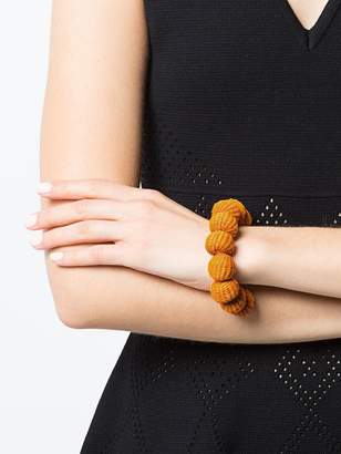 Carolina Herrera raffia beads bracelet