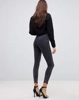 Thumbnail for your product : ASOS DESIGN Ridley high waist skinny jeans in mottled black with raw hem