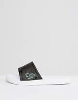 Thumbnail for your product : Lacoste Sliders In Black With Croc Logo