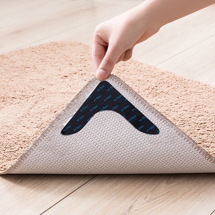 https://img.shopstyle-cdn.com/sim/00/d5/00d506b4c2d19b22eb39b4f048e5c14e_best/pro-space-rug-pads-grippers-carpet-tape-4-pcs-non-slip-rug-tape-for-hardwood-floors-and-tiles-keep-your-rug-in-place.jpg