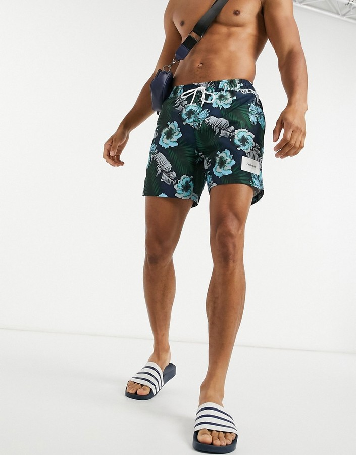 Calvin Klein medium length swim short in tropical print - ShopStyle
