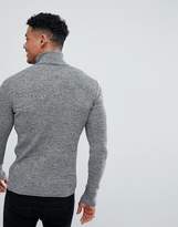 Thumbnail for your product : ASOS DESIGN muscle fit ribbed roll neck sweater in black & white twist