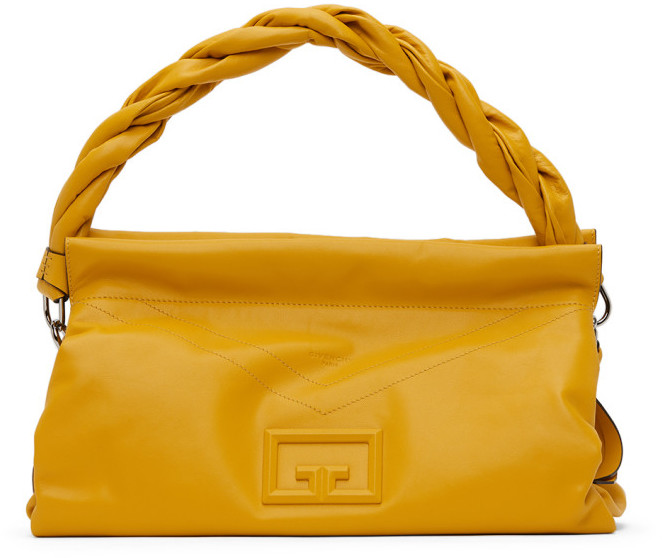large yellow clutch bag