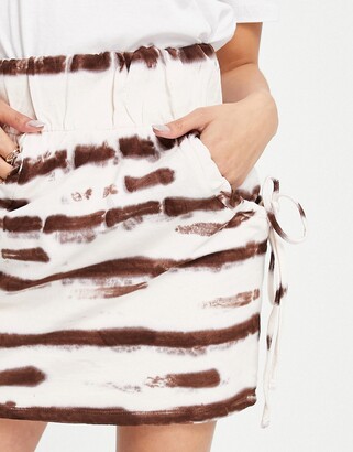 ASOS Petite DESIGN Petite jersey mini skirt with ruched pocket detail in brown & white tie dye print