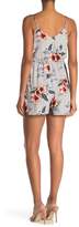Thumbnail for your product : Collective Concepts Floral Print Surplice Romper