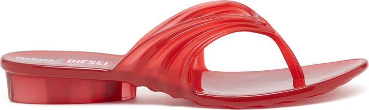 Sculptural flip-flops in Melflex