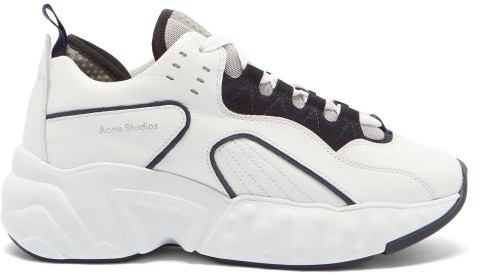 white tennis shoes with black soles