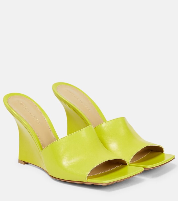 yellow wedge pumps