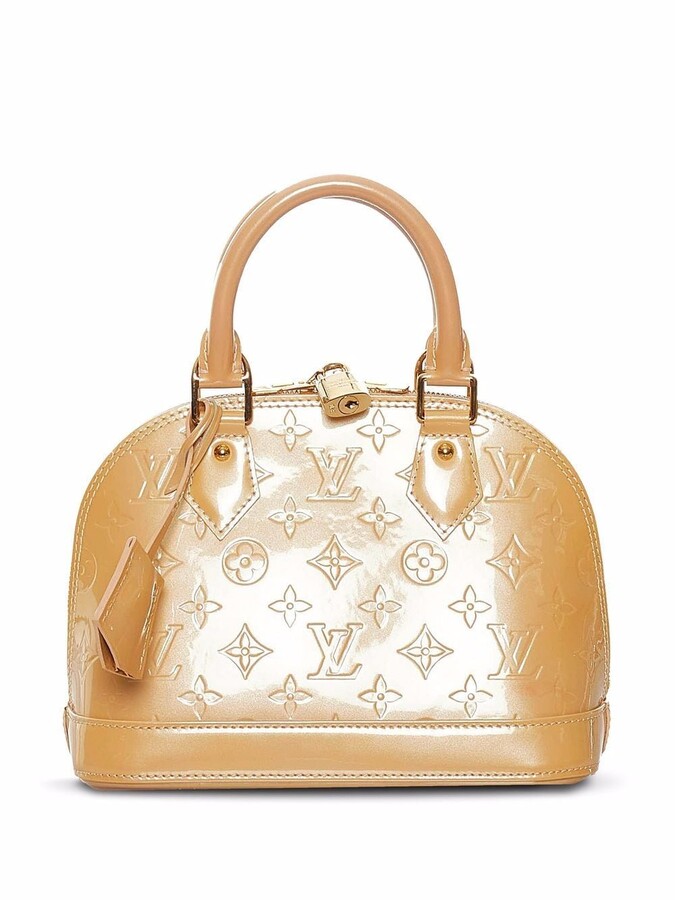 louis vuitton cream handbolsa