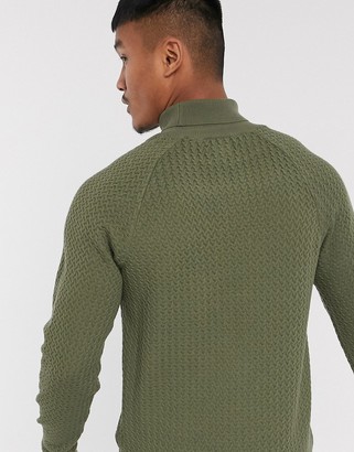 ASOS DESIGN knitted roll neck sweater with basket texture in khaki