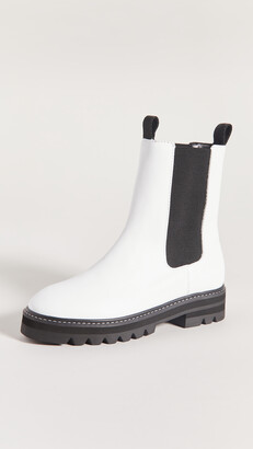 white boots with black sole