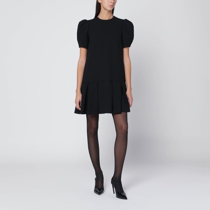 Black mini dress with pleats
