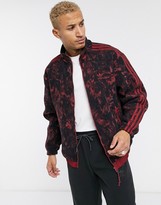 Thumbnail for your product : adidas tech fleece jacket with all over print and reflective details tech pack