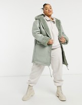 Thumbnail for your product : ASOS Curve DESIGN Curve leather look parka with borg lining in sage
