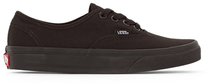 black vans with black soles