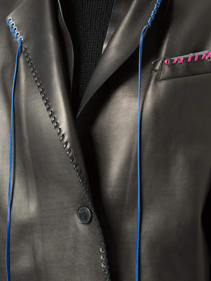 Alexander McQueen whip-stitched leather coat