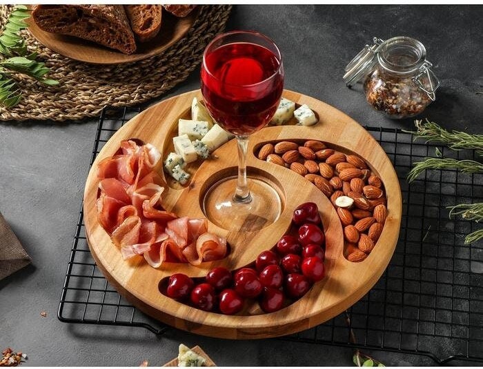 https://img.shopstyle-cdn.com/sim/02/c5/02c5713dc41cb0548b7b7b36a88260f4_best/wooden-round-serving-fruit-tray-with-engraving-kitchen-ware-snack-tray-home-decor-charcuterie-bowls-wood-divided-plate.jpg