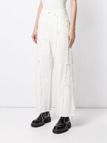 Thumbnail for your product : Sjyp Frayed Seam Denim Trousers
