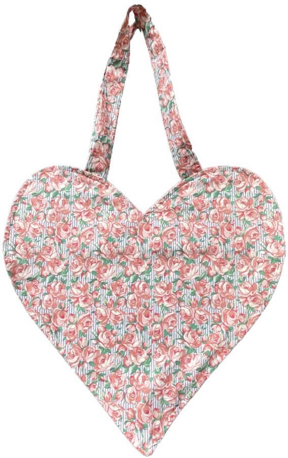 pink heart shaped purse