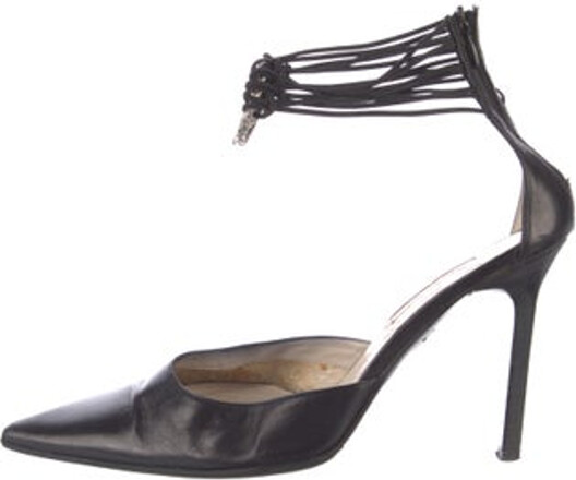 Cesare Paciotti Leather D'Orsay Pumps Black Pointed-Toes with Braided Accents Wrap-Around Straps & Concealed Zip Closure at Sides Includes Dust Bag Unfortunately, due to restrictions, this item may not be eligible for shipping in all areas.