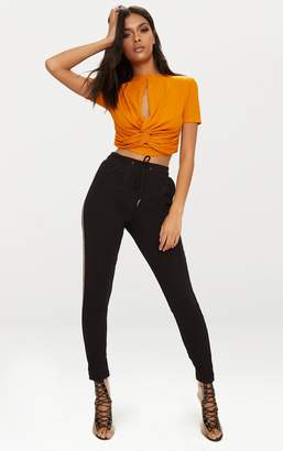 PrettyLittleThing Black Rib Keyhole Knot Front Crop Top