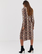 Thumbnail for your product : ASOS DESIGN DESIGN relaxed long sleeve midi dress with knot front in snake print