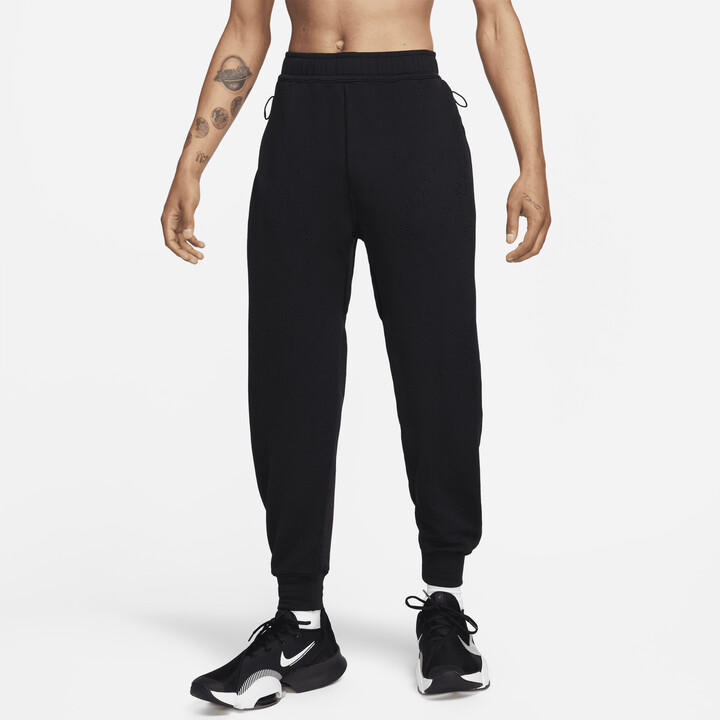 Nike Men's A.P.S. Therma-FIT Versatile Pants in Black - ShopStyle