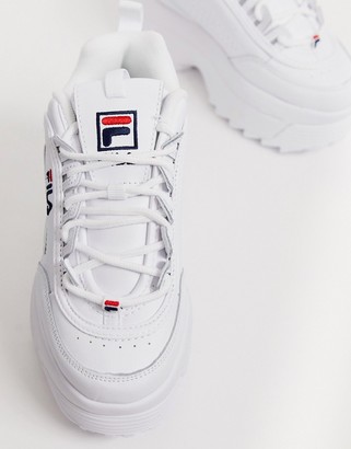 Fila Disruptor II platform wedge sneakers in white - ShopStyle
