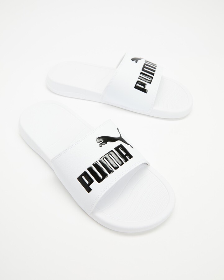 puma white flip flops mens