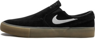 black nike slip ons