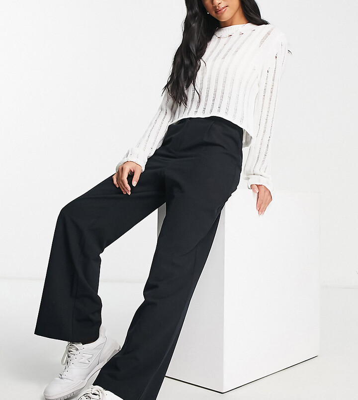 ASOS DESIGN low rise flare pants with strap detail and ruched waist in black  - ShopStyle Wide-Leg Trousers