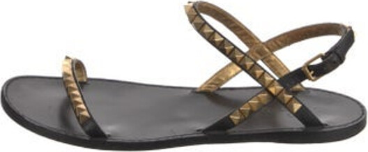 Valentino Leather Slingback Sandals Black & Gold Rockstud Accents Studded Accents Straps & Buckle Closure at Ankles Includes Dust Bag Unfortunately due to restrictions this item may not be eligible for shipping in all areas.